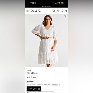 Estelle white embroidery drop hem dress